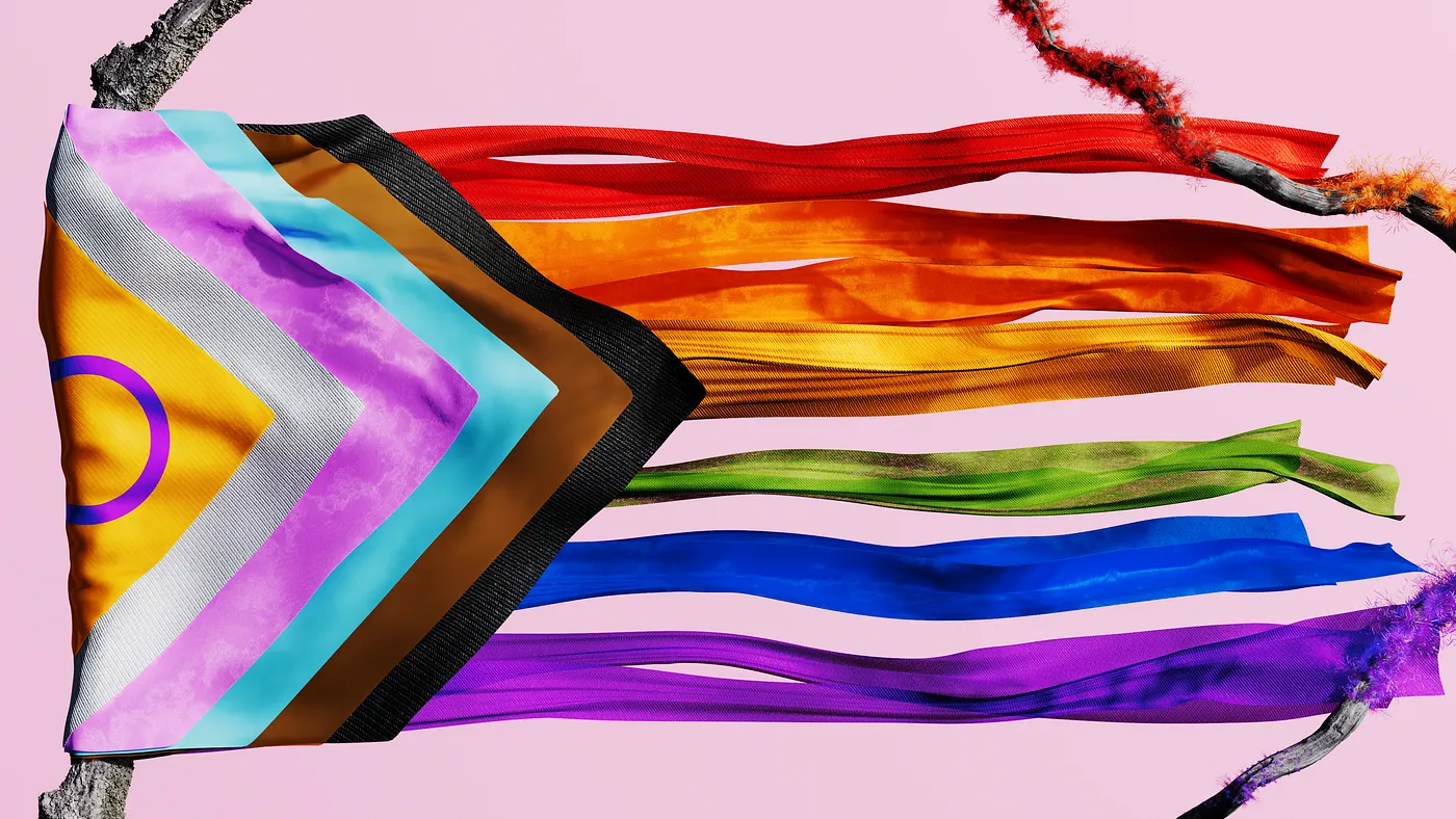 A Progress Pride flag with an intersex inclusion circle and colored stripes, draped on branches, with long, flowing ribbon tails on a pink background.