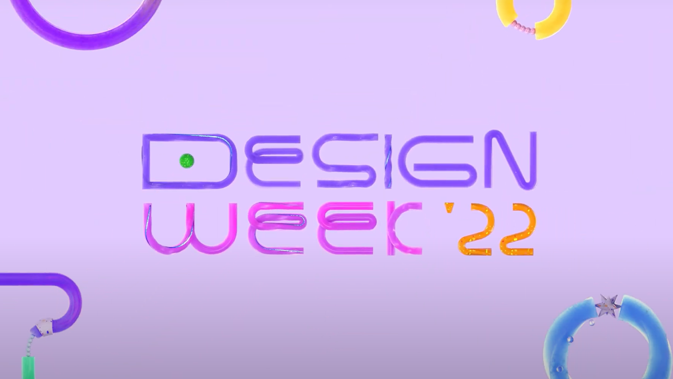 The image features the text "Design Week '22" in stylized, colorful letters on a light purple background. The word "Design" is in purple with a green dot inside the "D," while "Week '22" is in pink and orange hues.