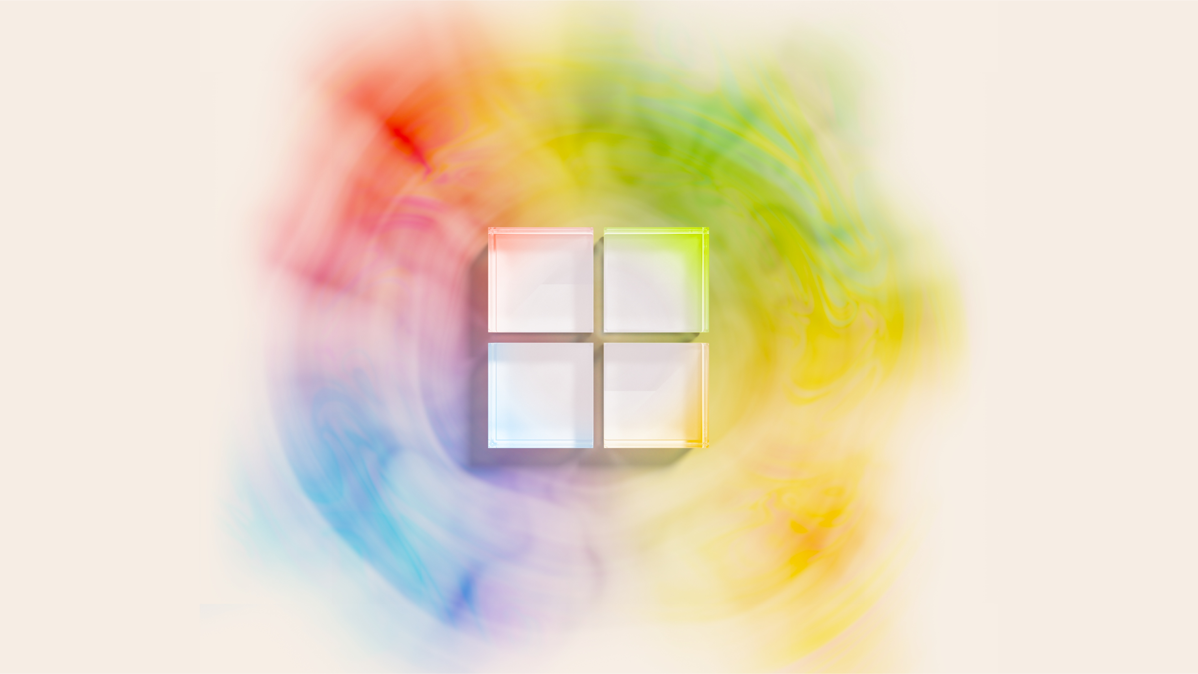 The image shows a logo with four small white squares arranged in a 2x2 grid, creating a larger square. Surrounding the logo is a misty, colorful aura with swirls of red, orange, yellow, green, blue, and purple blending together against a light background.