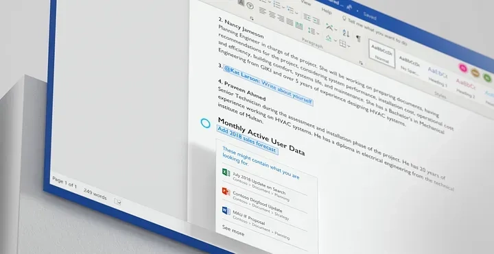 Close-up of a computer screen displaying a document in a word processing program. The document contains text outlining various topics, including user data, and an embedded chart titled "Monthly Active User Data," highlighting entries for April, May, and June 2018.