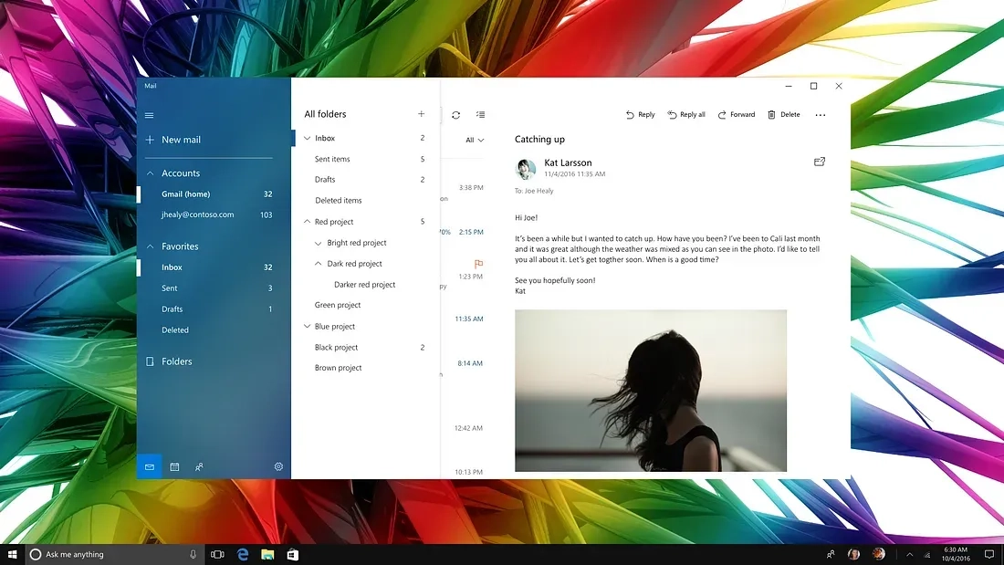 A screenshot of an email application on a Windows operating system. The screen displays the inbox, sent items, drafts, and multiple project folders on the left. The main window shows an open email with the subject "Catching up" and an image of a person with long hair.