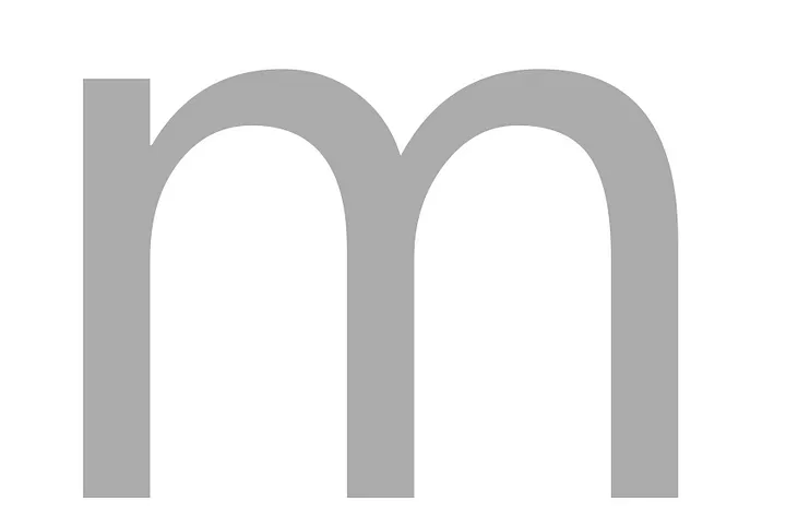 A large, gray lowercase letter "m" on a white background.