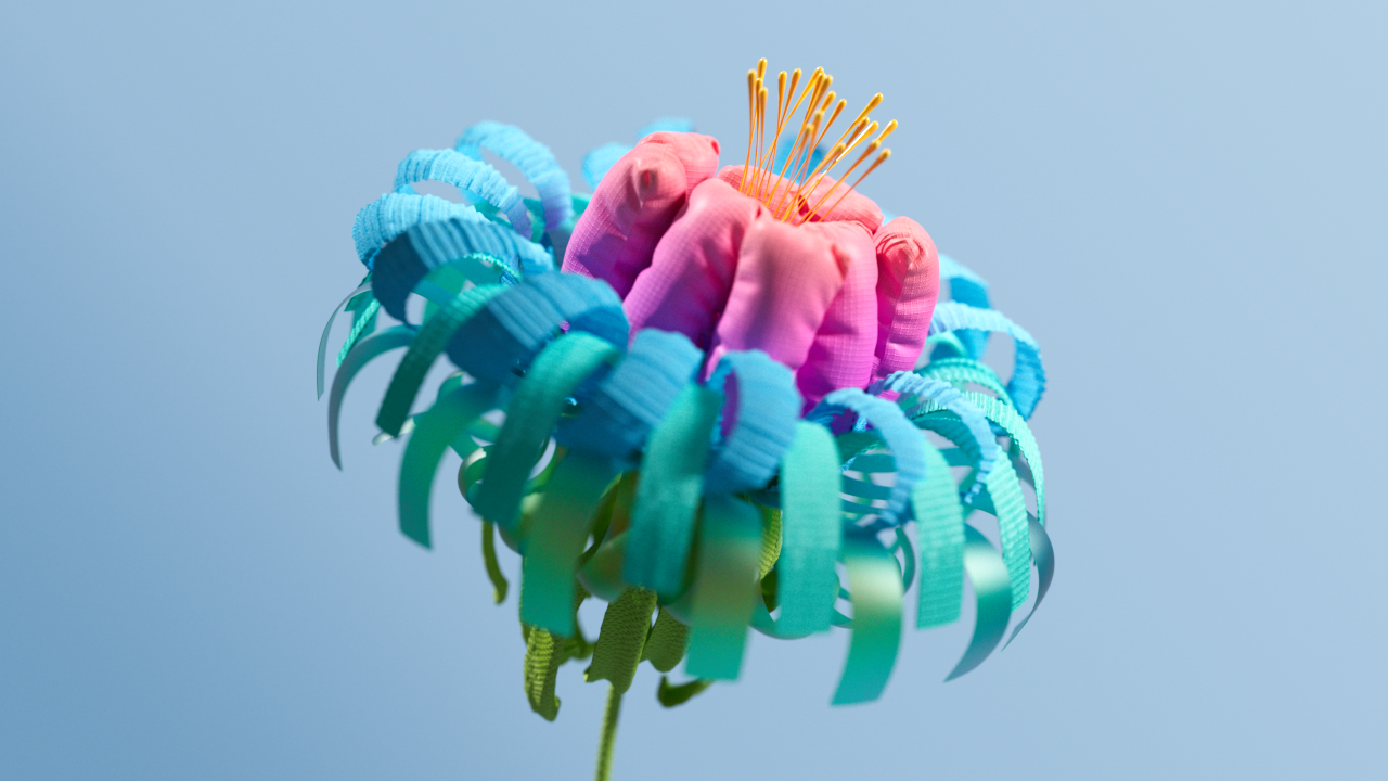 A close-up of a colorful, artificial flower with curled blue petals, pink center, and yellow stamen-like structures, set against a plain light blue background.