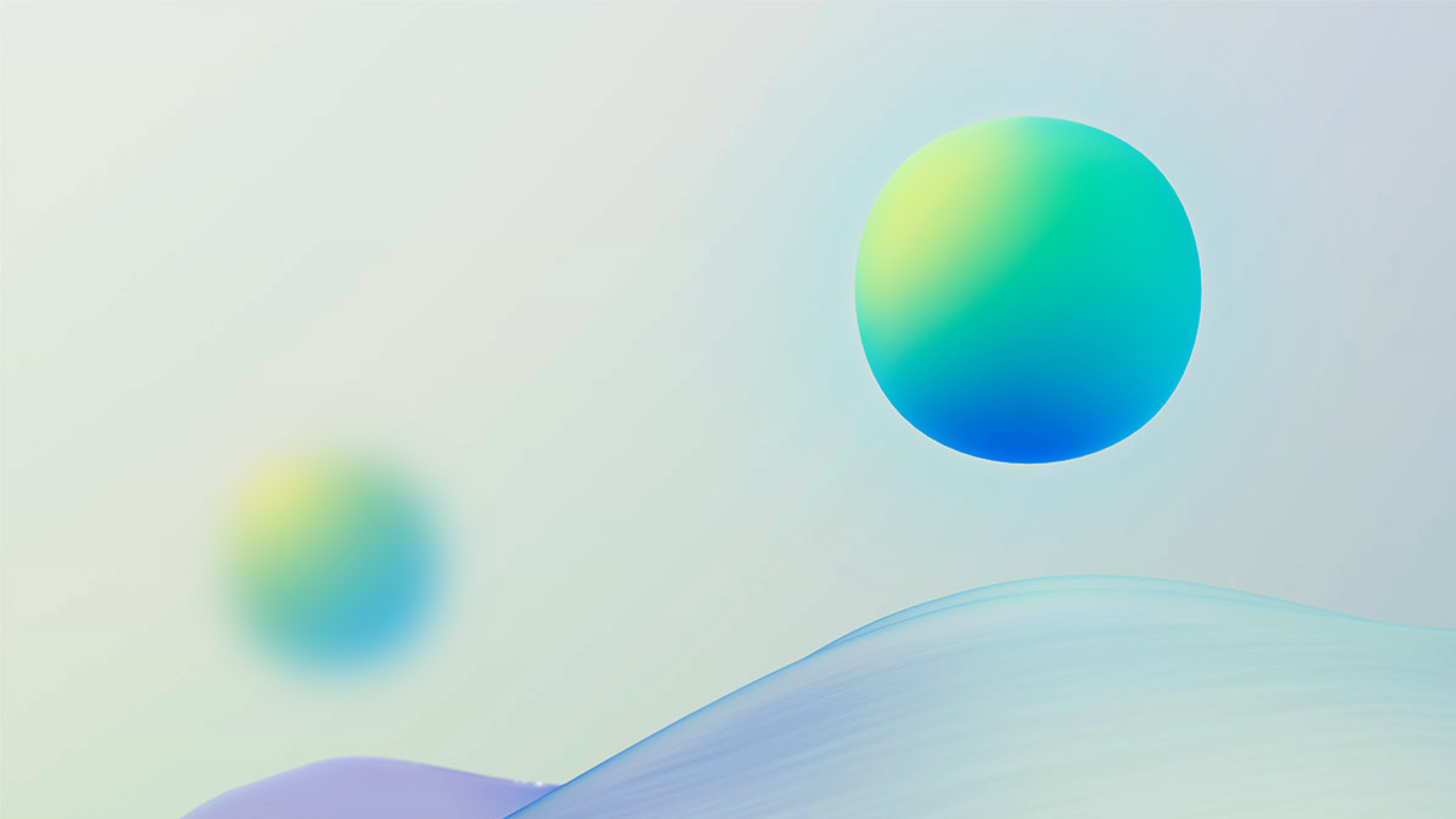 Two softly colored, glowing spheres float above a smooth, wavy surface against a light, pastel gradient background, creating an abstract and serene composition.