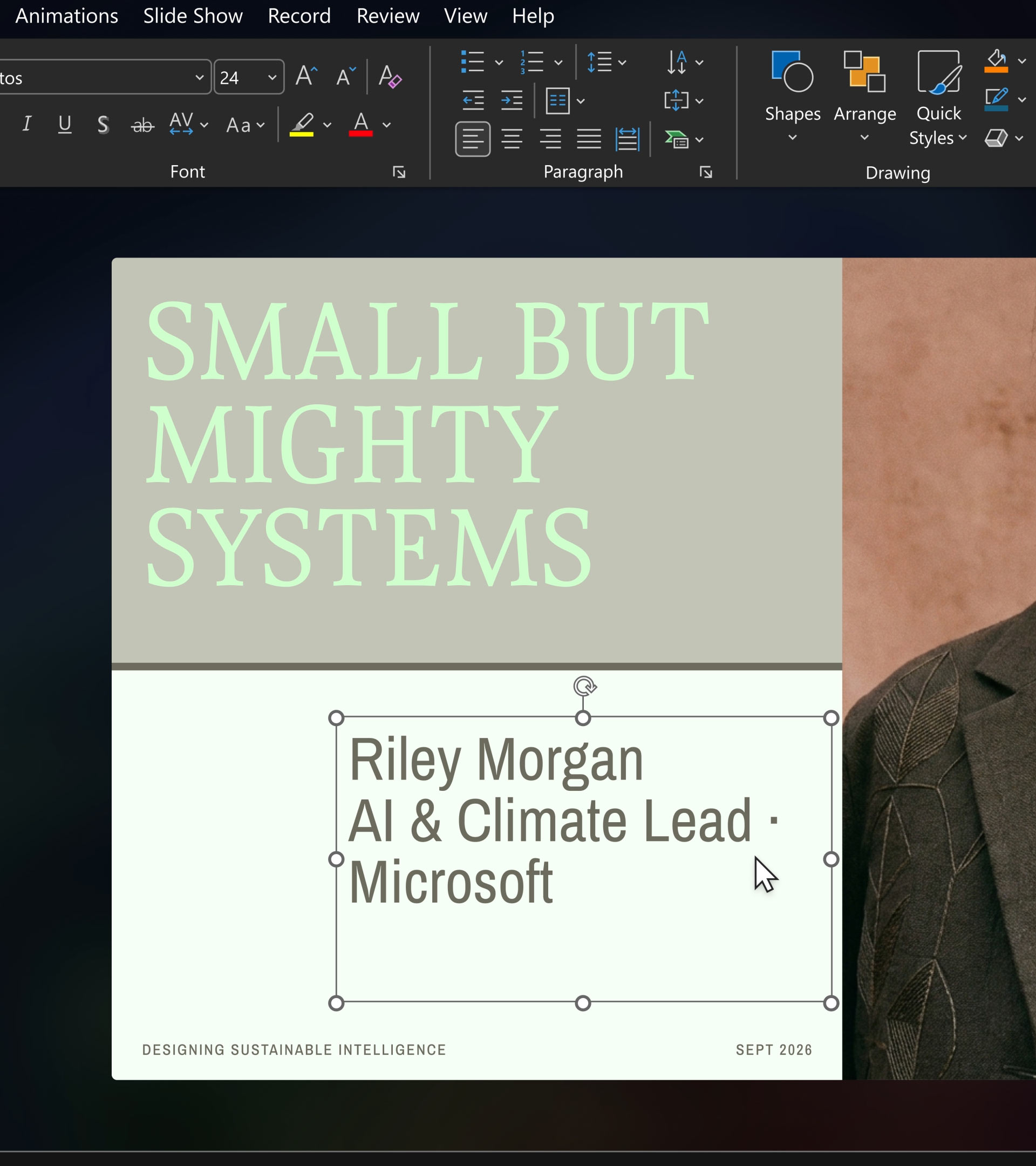 A PowerPoint slide titled "Small But Mighty Systems" features the name "Riley Morgan, AI & Climate Lead, Microsoft" and part of a person in a suit on the right. The presentation is about sustainable intelligence, dated September 2026.