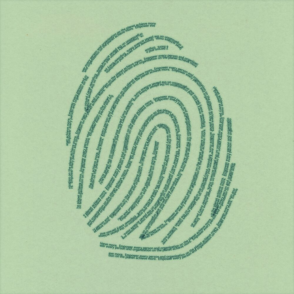A fingerprint made of tiny, closely spaced lines of printed text forms the distinct pattern of a fingerprint on a light green background.